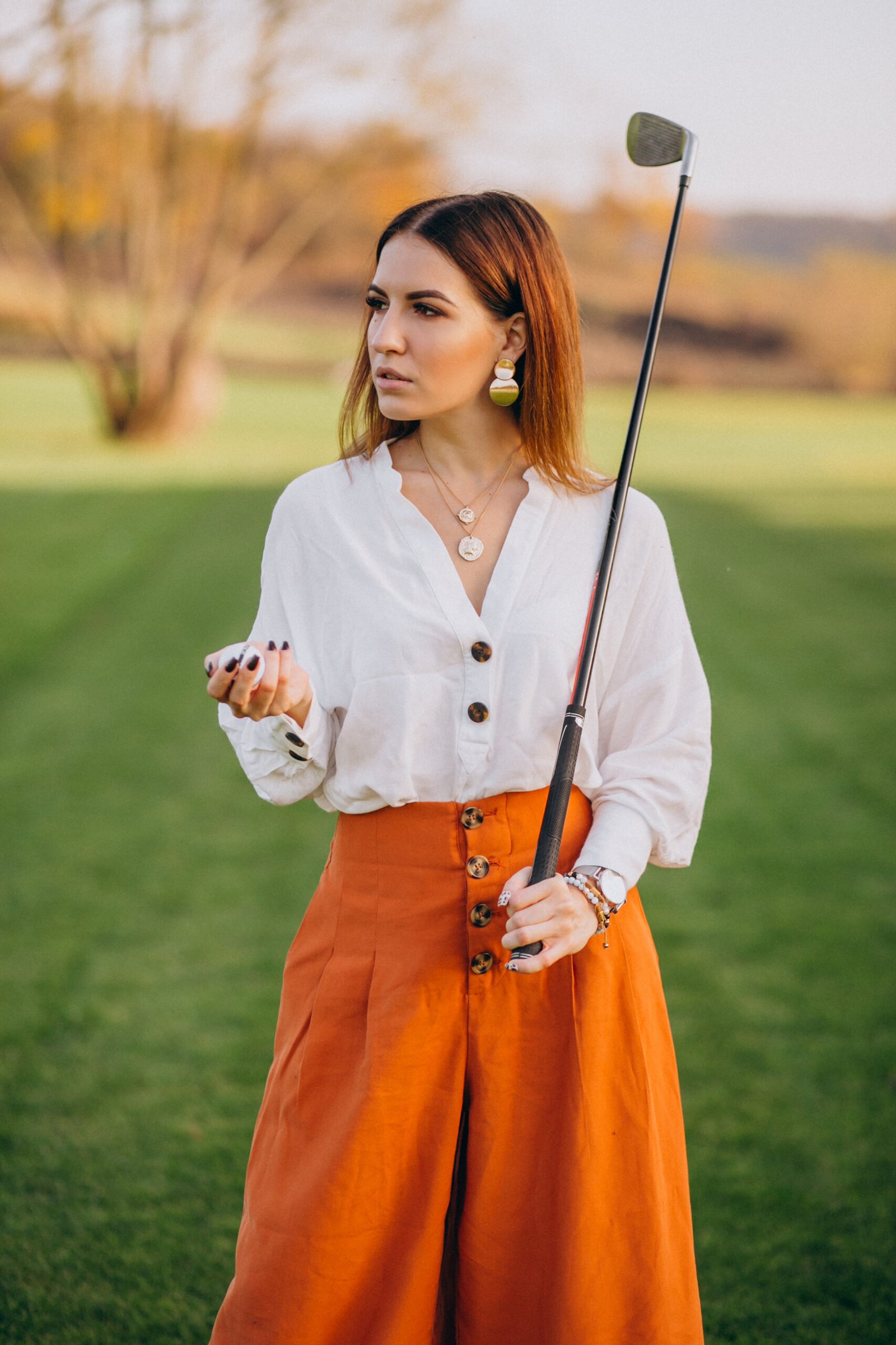 Young lady playing golf
